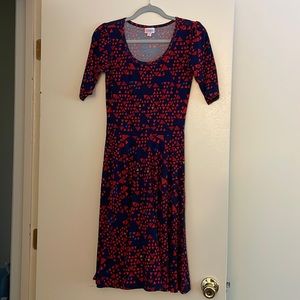 XS LulaRoe dress in blue with red triangle pattern.